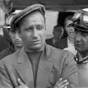 Juan Manuel Fangio in 1956, embodying Ferrari’s timeless style.